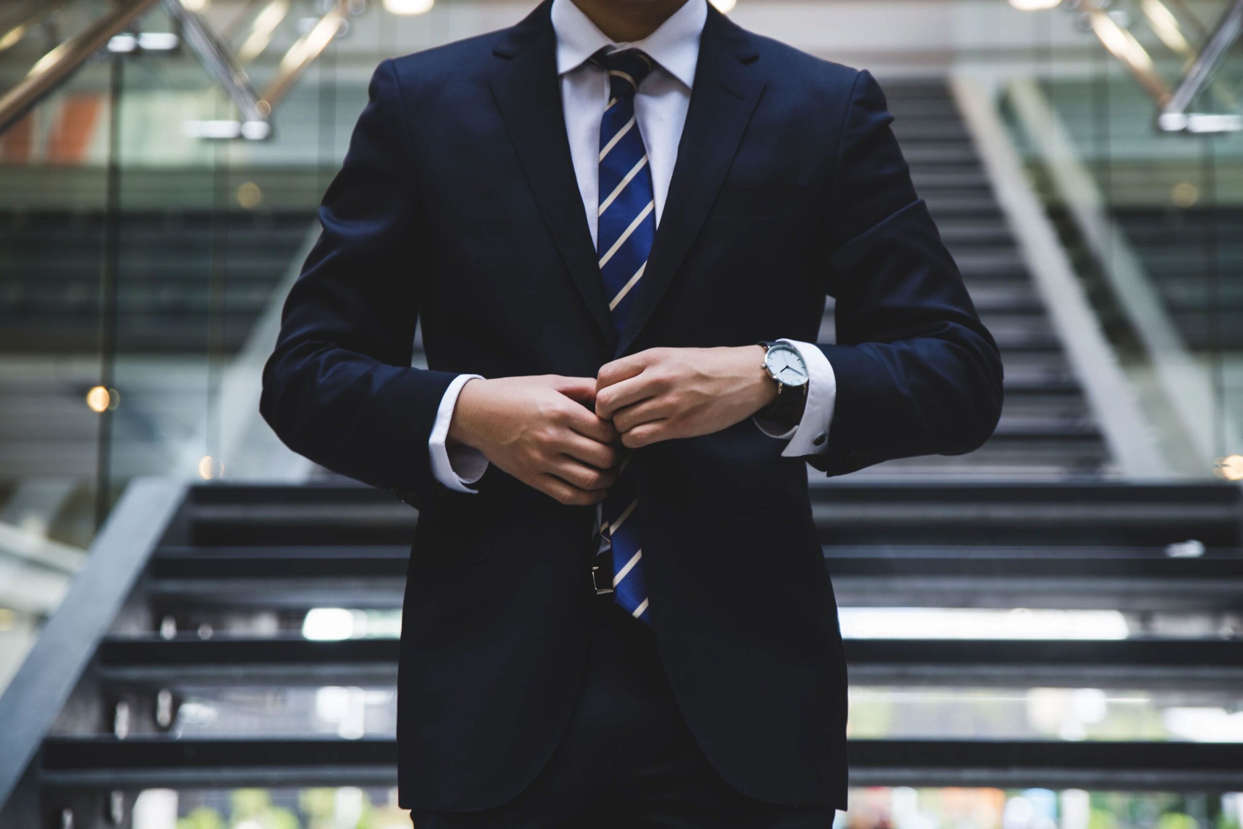 Man Buttoning Up Suit Jacket 1 Man Buttoning Up Suit Jacket 1