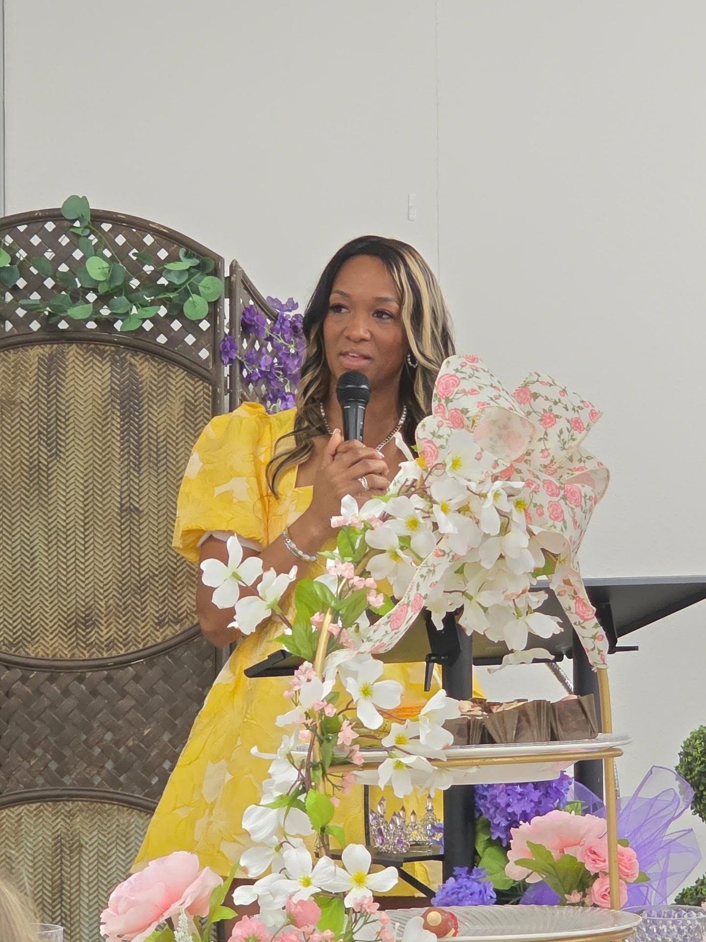 Takara Fuller-Doby speaking at the Hope for Her Panty Tea Party